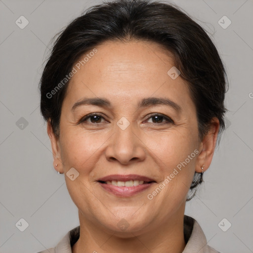 Joyful white adult female with medium  brown hair and brown eyes