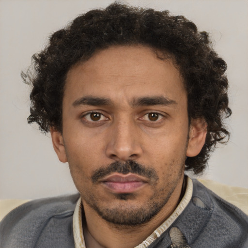 Neutral black young-adult male with short  brown hair and brown eyes