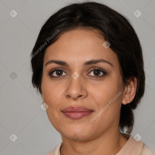 Joyful white adult female with medium  brown hair and brown eyes