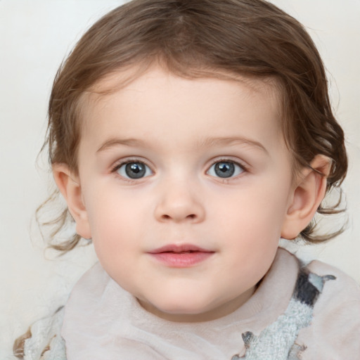 Joyful white child female with medium  brown hair and blue eyes