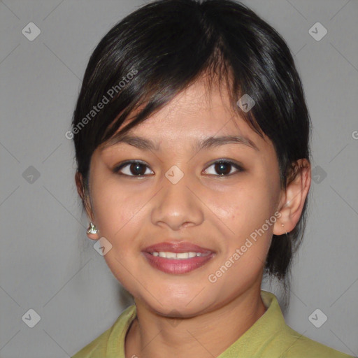 Joyful asian young-adult female with medium  brown hair and brown eyes