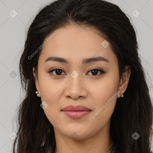 Joyful latino young-adult female with long  brown hair and brown eyes