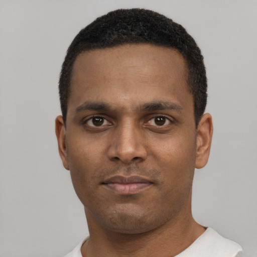 Neutral black young-adult male with short  black hair and brown eyes