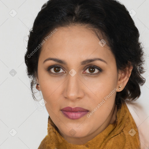 Joyful latino young-adult female with long  brown hair and brown eyes