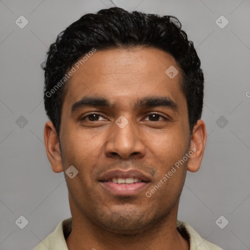 Joyful latino young-adult male with short  black hair and brown eyes