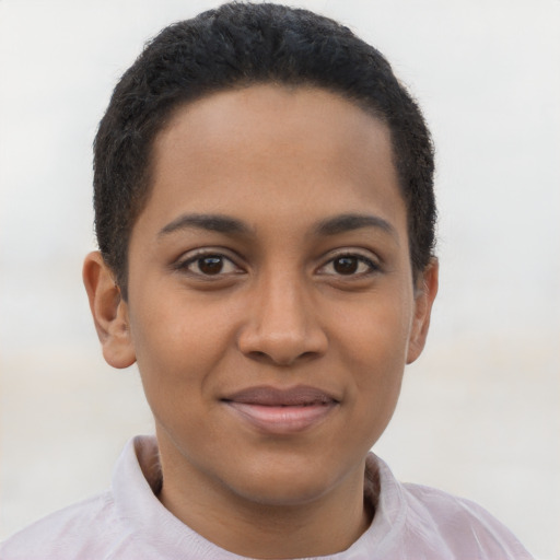 Joyful latino young-adult female with short  brown hair and brown eyes