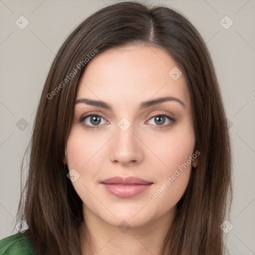 Neutral white young-adult female with long  brown hair and brown eyes