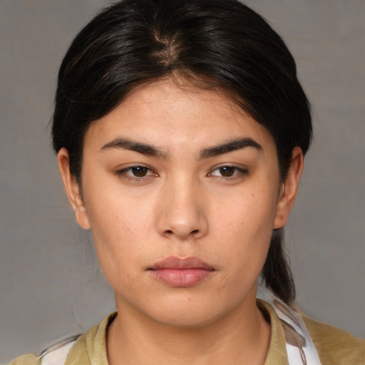 Neutral white young-adult female with medium  brown hair and brown eyes