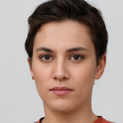 Neutral white young-adult female with short  brown hair and brown eyes