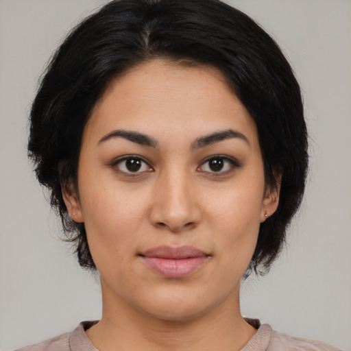 Neutral latino young-adult female with medium  black hair and brown eyes