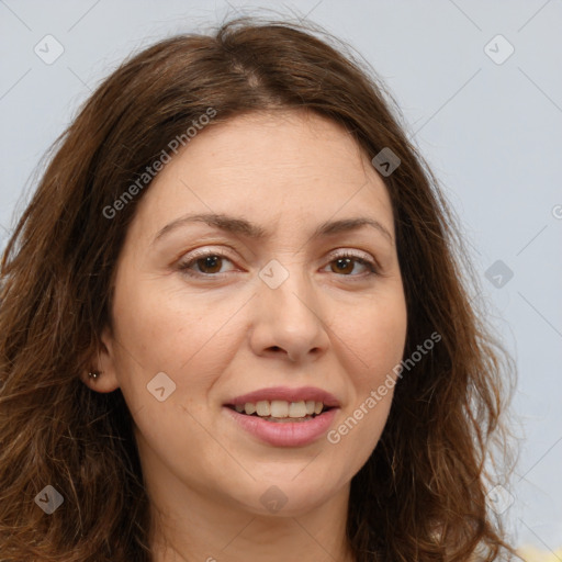 Joyful white adult female with long  brown hair and brown eyes