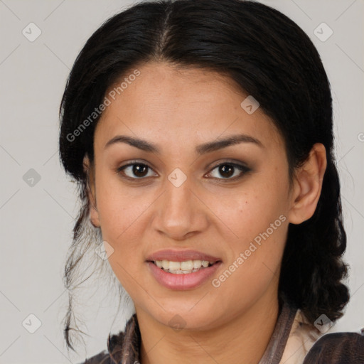 Joyful latino young-adult female with long  brown hair and brown eyes