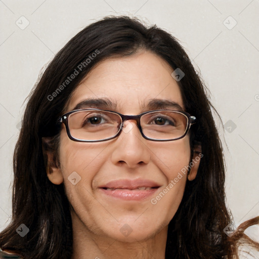 Joyful white adult female with long  brown hair and brown eyes