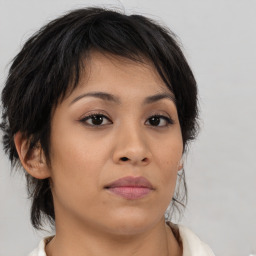 Neutral asian young-adult female with medium  brown hair and brown eyes