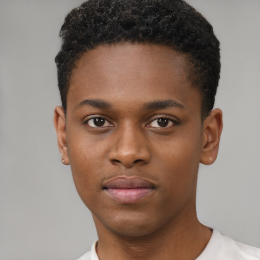 Neutral black young-adult male with short  brown hair and brown eyes