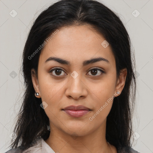 Joyful latino young-adult female with medium  brown hair and brown eyes