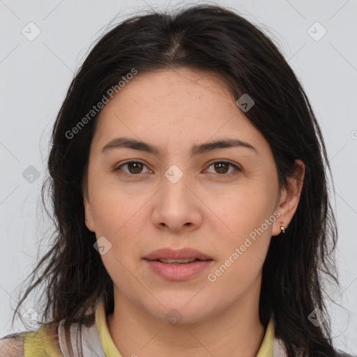 Joyful white adult female with medium  brown hair and brown eyes