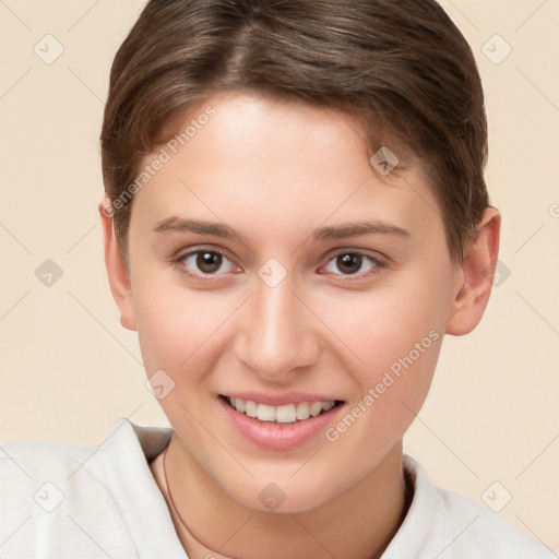 Joyful white young-adult female with short  brown hair and brown eyes