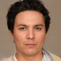 Neutral white adult male with short  brown hair and brown eyes