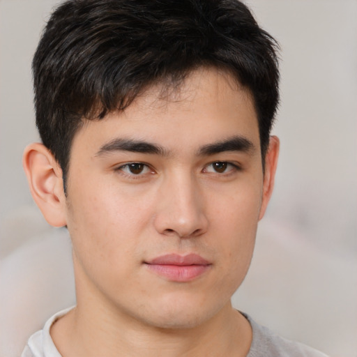 Neutral asian young-adult male with short  brown hair and brown eyes