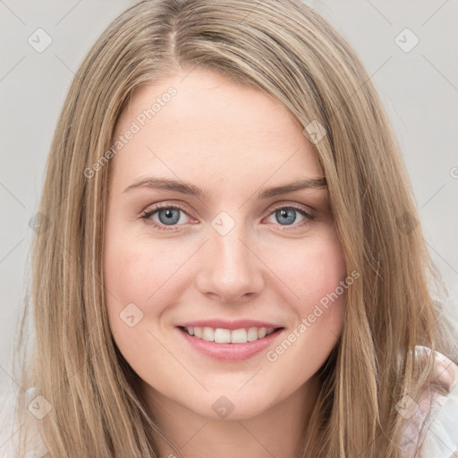 Joyful white young-adult female with long  brown hair and green eyes