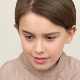 Joyful white child female with short  brown hair and brown eyes