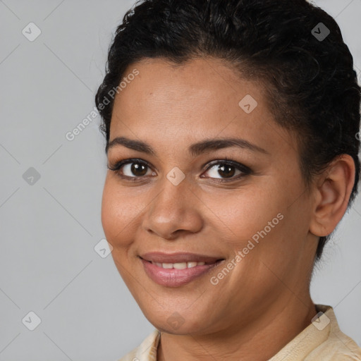 Joyful latino young-adult female with short  brown hair and brown eyes