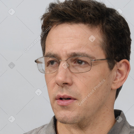 Neutral white adult male with short  brown hair and brown eyes