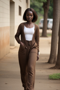 Ugandan adult female with  brown hair