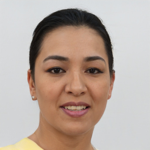 Joyful asian young-adult female with short  brown hair and brown eyes