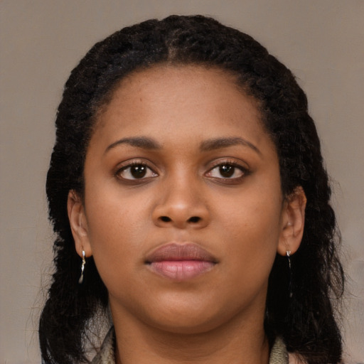 Neutral black young-adult female with long  black hair and brown eyes