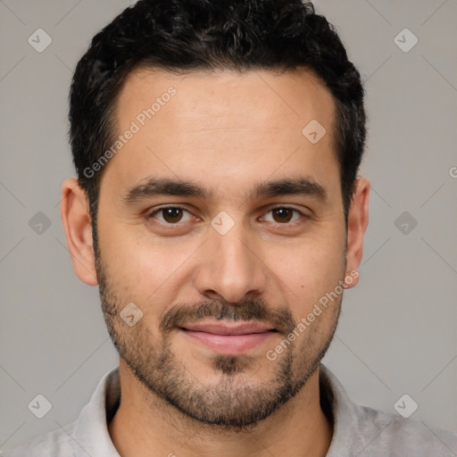 Joyful white young-adult male with short  black hair and brown eyes