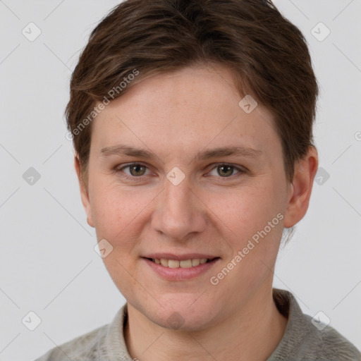 Joyful white young-adult female with short  brown hair and grey eyes