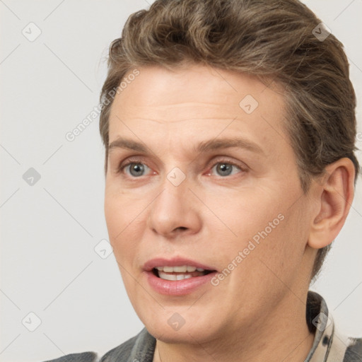 Joyful white adult female with short  brown hair and brown eyes