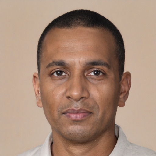 Neutral black adult male with short  black hair and brown eyes