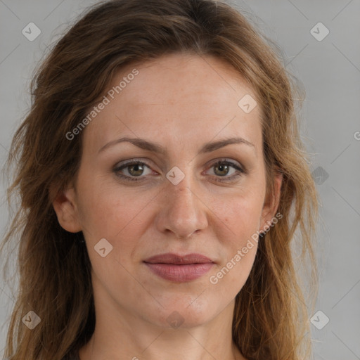 Joyful white adult female with long  brown hair and brown eyes