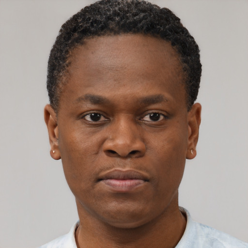 Neutral black young-adult male with short  brown hair and brown eyes