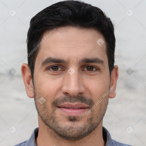 Joyful white young-adult male with short  brown hair and brown eyes