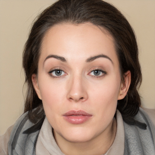 Neutral white young-adult female with medium  brown hair and brown eyes