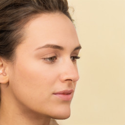 Neutral white young-adult female with short  brown hair and brown eyes