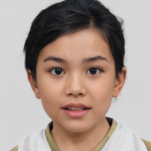 Joyful asian child female with medium  brown hair and brown eyes