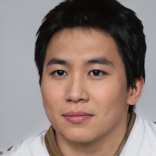 Neutral asian young-adult male with short  brown hair and brown eyes