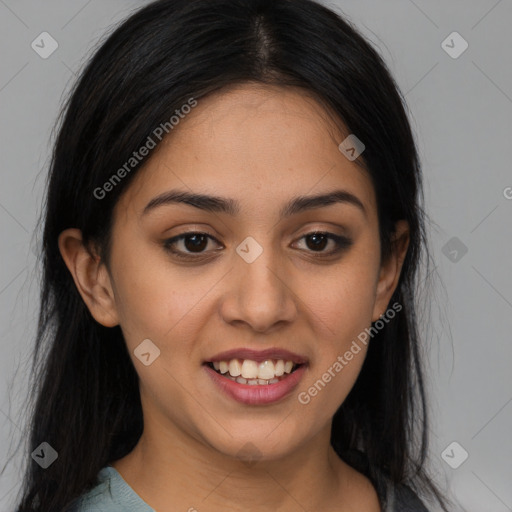 Joyful latino young-adult female with long  black hair and brown eyes