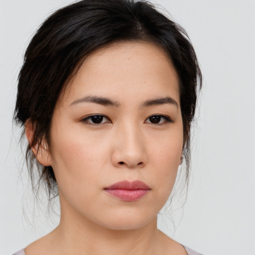 Neutral asian young-adult female with medium  black hair and brown eyes