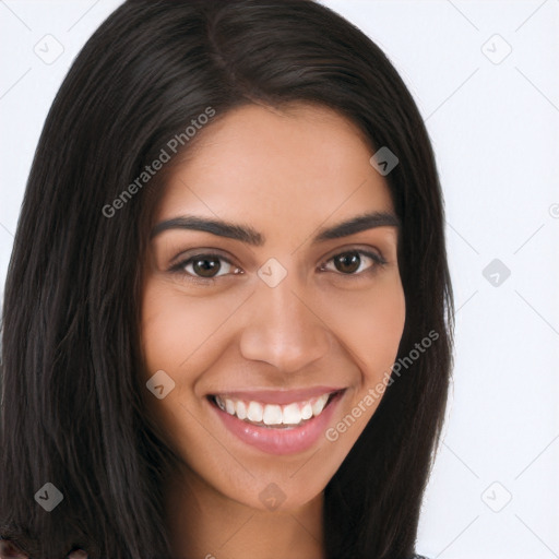 Joyful latino young-adult female with long  brown hair and brown eyes