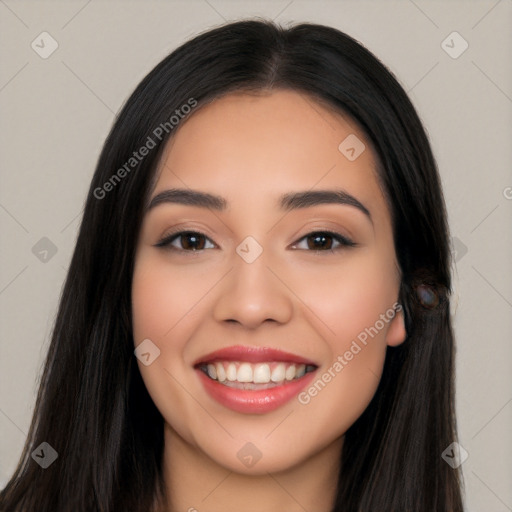 Joyful white young-adult female with long  black hair and brown eyes