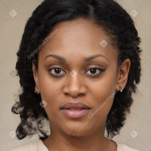 Joyful black young-adult female with medium  black hair and brown eyes