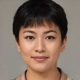 Joyful asian young-adult female with short  brown hair and brown eyes