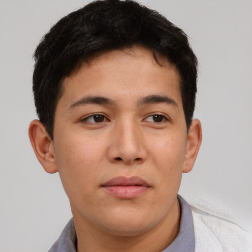 Neutral asian young-adult male with short  brown hair and brown eyes