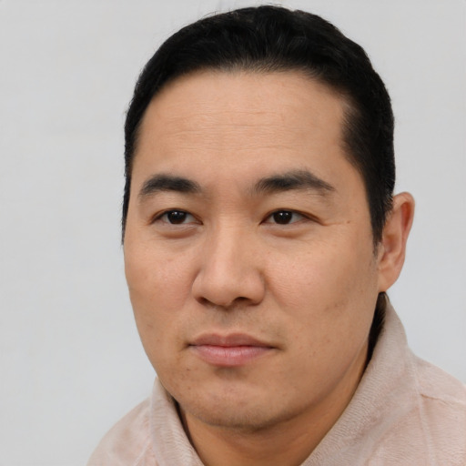 Neutral asian young-adult male with short  black hair and brown eyes